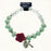 Turquoise and White Stretch Bracelet with Crystals and Red Rose Shaped Resin Bead
